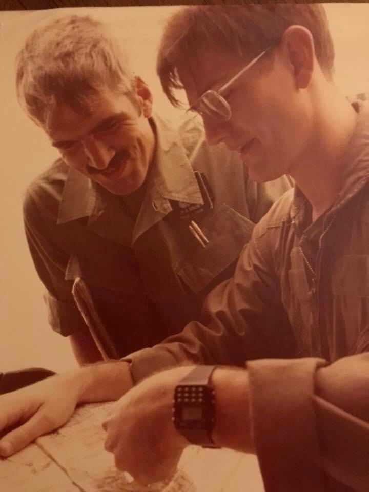 Pat Sinon and me planning some exfil in the Philippines; he's laughing because I'm a 1LT (that Casio tho!)